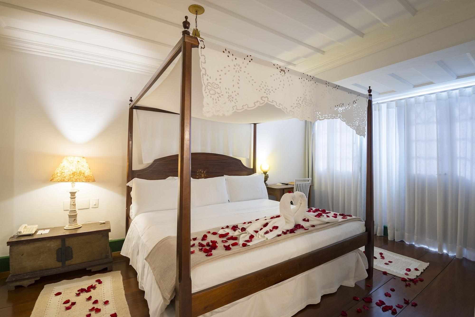 Hotel Solar Do Rosario Ouro Preto  Exterior photo A four-poster bed