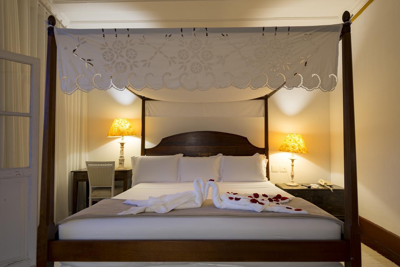 Hotel Solar Do Rosario Ouro Preto  Exterior photo A four-poster bed